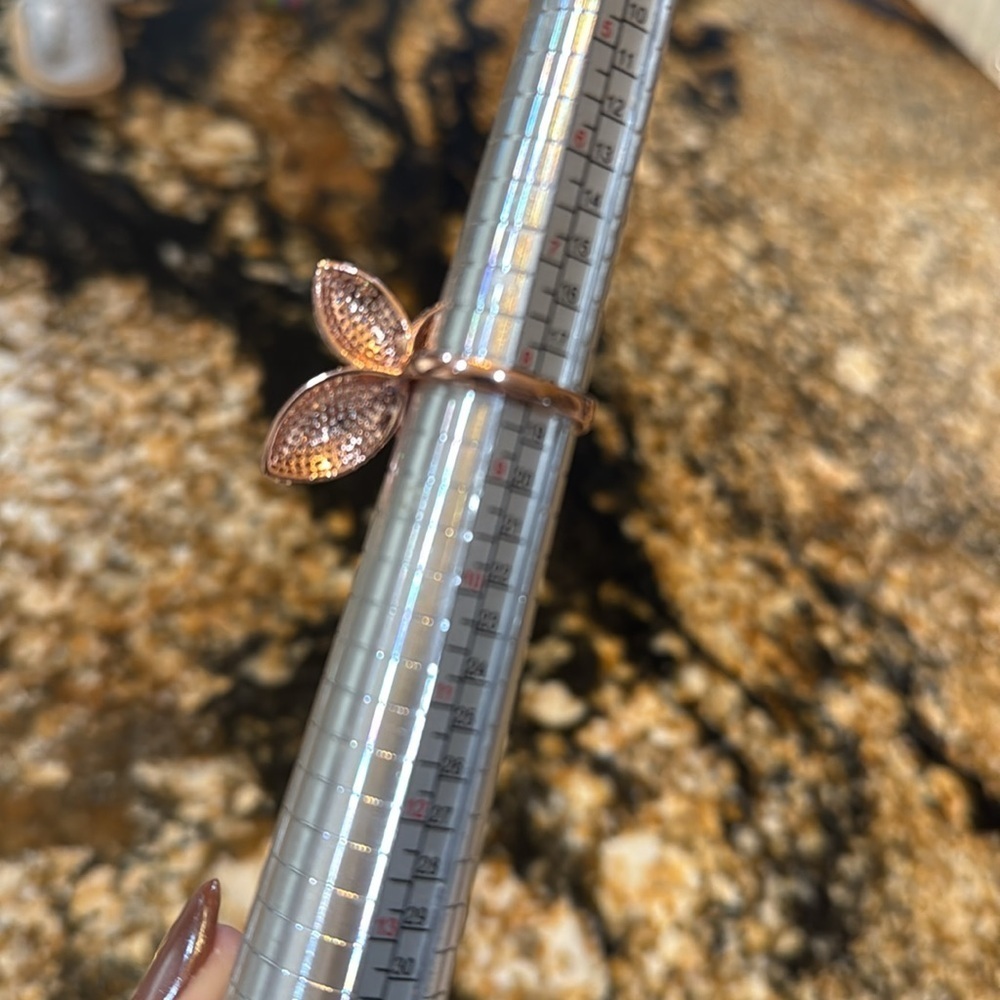 Elegant Rose Gold Floral Ring set on a sterling silver base. - Picture 11 of 11